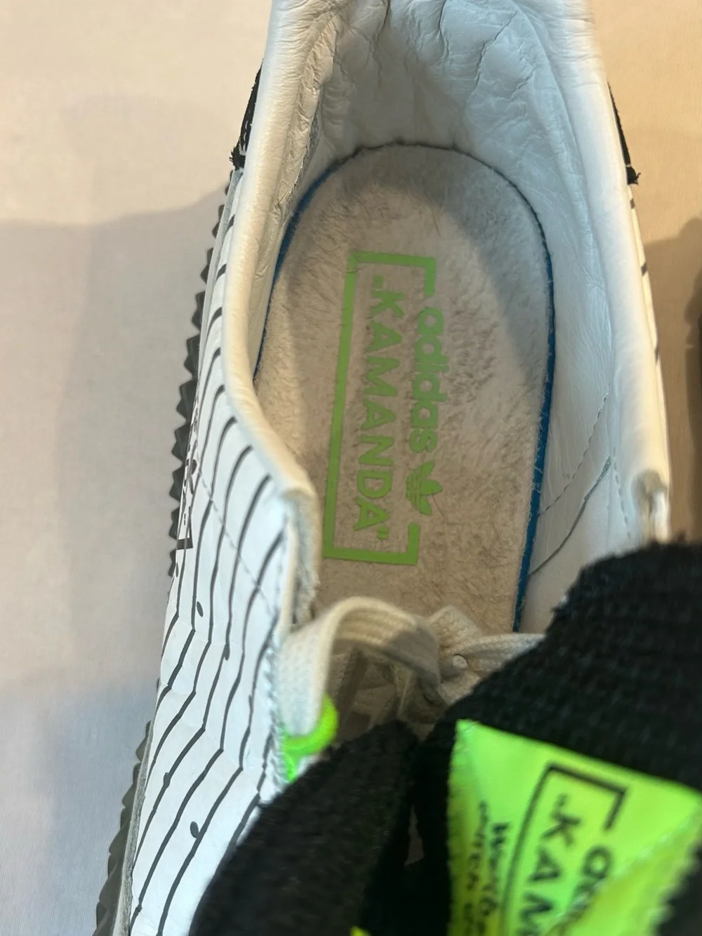 adidas mens Kamanda White Sneakers with Black and Neon Green Accents